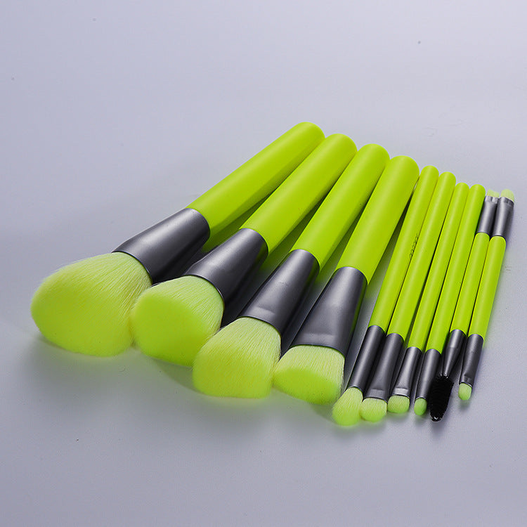 Professional neon makeup brushes set with fluorescent green handles and artificial fiber bristles, ideal for makeup application.