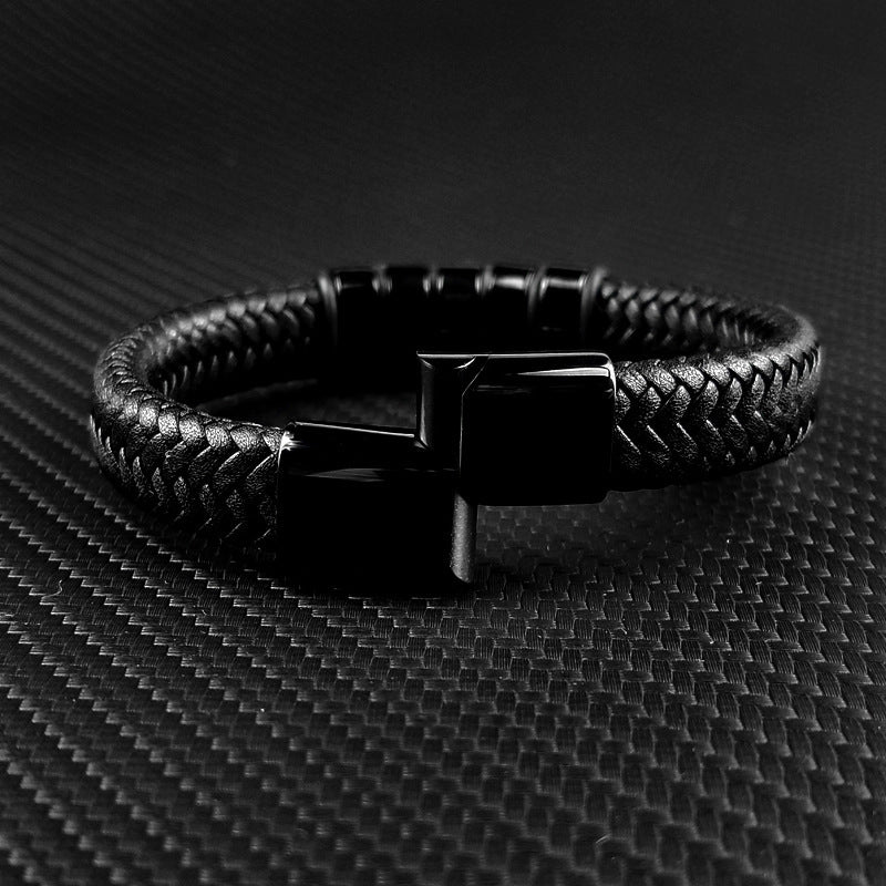 custom family name bracelets featuring a sleek black braided leather design with a stylish clasp.