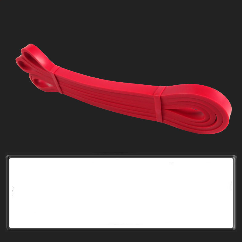 Red resistance band on a black background