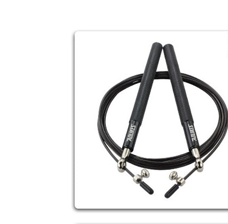 Black jump rope with silver clumps on a white background