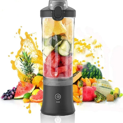 Portable Blender 600ML Electric with fresh fruits and splashes of juice in the background