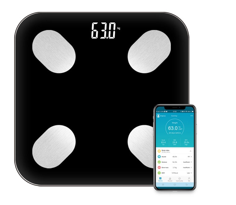 Digital body fat scale with smartphone displaying app interface on a white background