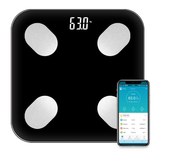 Digital body fat scale with smartphone displaying app interface on a white background